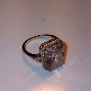Sterling Silver ring with large crystal surrounded by smaller sizes. Vintage